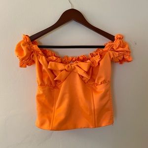 I am Gia orange Naomi top